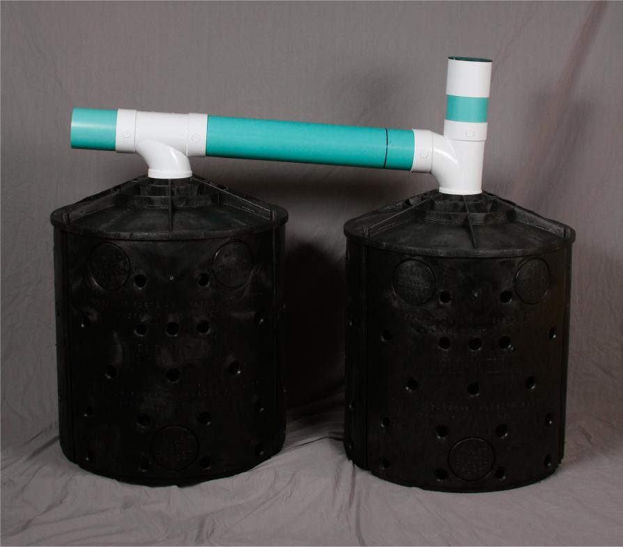 Two drywell kits installed in series is standard practice to allow first drywell to accumulate solids, protecting the longevity of the second, overflow drywell.